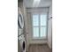 Washer and dryer in laundry area with a window at 804 N Main St, Oakboro, NC 28129