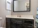 Bathroom with a large vanity, mirror, and well-lit space at 8208 Cedar Glen Dr, Charlotte, NC 28212