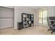 Bedroom featuring a modern shelf, closet, and a bright window at 8208 Cedar Glen Dr, Charlotte, NC 28212