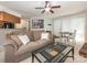 Inviting living room features a comfortable couch, stylish coffee table, and adjacent dining area at 8208 Cedar Glen Dr, Charlotte, NC 28212