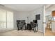 Bright office featuring natural light, carpet flooring, and desk spaces at 8208 Cedar Glen Dr, Charlotte, NC 28212