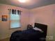 Bedroom with a bed and window at 823 Corbin St, Albemarle, NC 28001