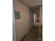 Hallway featuring neutral carpet and walls, a closet, and a view to another room at 823 Corbin St, Albemarle, NC 28001