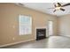 Comfortable living room with a fireplace and access to the backyard at 9564 Kings Parade Blvd, Charlotte, NC 28273