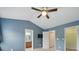 Primary bedroom featuring vaulted ceilings, en suite bathroom, and a walk-in closet at 9564 Kings Parade Blvd, Charlotte, NC 28273