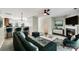 Chic living room with a cozy fireplace, plush seating, and modern décor for stylish comfort at 9800 Walkers Glen Nw Dr, Concord, NC 28027