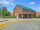 Exterior view of W.R. Odell Primary School featuring brick architecture and well-maintained landscaping at 9800 Walkers Glen Nw Dr, Concord, NC 28027