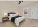 Cozy bedroom with neutral tones and ample natural light at 1003 S Ridge Ave, Kannapolis, NC 28083