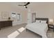 Bright bedroom features hardwood floors, a dresser, and natural light at 1003 S Ridge Ave, Kannapolis, NC 28083