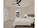 This bedroom features a neutral color palette and modern ceiling fan at 1003 S Ridge Ave, Kannapolis, NC 28083