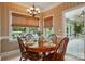 Charming breakfast nook with natural light and views of the backyard at 102 Rosewood Ln, Locust, NC 28097