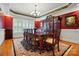 Formal dining room featuring a chandelier and elegant furnishings at 102 Rosewood Ln, Locust, NC 28097