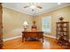 Home office with hardwood floors, shutters and built in shelves at 102 Rosewood Ln, Locust, NC 28097