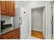 Galley kitchen with stainless appliances and updated features at 102 Rosewood Ln, Locust, NC 28097