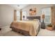 This bedroom features a vaulted ceiling, a wicker headboard, and two windows with blinds and curtains at 10306 Madison Park Dr, Charlotte, NC 28269