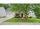 Beautiful home with a manicured lawn and front yard landscaping at 10306 Madison Park Dr, Charlotte, NC 28269
