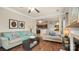 Open-concept living room features hardwood floors, modern decor, and an inviting atmosphere at 10306 Madison Park Dr, Charlotte, NC 28269
