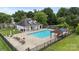 Aerial view of a community pool with ample seating and a gazebo at 10306 Madison Park Dr, Charlotte, NC 28269
