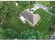 Aerial view of home with an enclosed patio and manicured lawn at 104 Laura Ct, Cherryville, NC 28021
