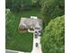 Aerial view of a brick home with a manicured lawn and driveway holding 3 vehicles at 104 Laura Ct, Cherryville, NC 28021