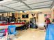Organized garage featuring ample storage space and room for a boat at 104 Laura Ct, Cherryville, NC 28021