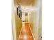 Inviting hallway featuring hardwood floors and neutral paint at 104 Laura Ct, Cherryville, NC 28021