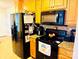 Functional kitchen featuring granite countertops and stainless steel appliances at 104 Laura Ct, Cherryville, NC 28021