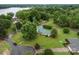 An aerial view showcases the property, highlighting its lush surroundings near the water at 105 Pelican Ct, Mooresville, NC 28117