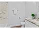 Cozy bathroom with marble accents in shower, vanity, and toilet offering a clean aesthetic at 105 Pelican Ct, Mooresville, NC 28117