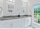 Bright bathroom with dual vanity and granite counter at 105 Pelican Ct, Mooresville, NC 28117