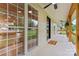 Covered porch featuring ceiling fans and neutral-toned accents, offering a perfect outdoor space at 105 Pelican Ct, Mooresville, NC 28117