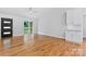 Bright, open living room with hardwood floors and sliding glass doors for ample natural light at 105 Pelican Ct, Mooresville, NC 28117