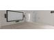 Finished basement with projector screen, speakers and doors at 10508 Kristens Mare Dr, Charlotte, NC 28277