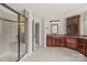 Bathroom featuring custom vanity, a walk-in shower, and tiled flooring and plenty of space to move around at 10508 Kristens Mare Dr, Charlotte, NC 28277
