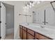 Bright bathroom with double vanity and shower-tub at 10508 Kristens Mare Dr, Charlotte, NC 28277