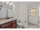 Bathroom featuring a granite vanity, modern fixtures, toilet and shower at 10508 Kristens Mare Dr, Charlotte, NC 28277