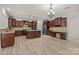 Gourmet kitchen with granite countertops, stainless steel appliances, and a central island for food preparation at 10508 Kristens Mare Dr, Charlotte, NC 28277