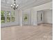 Spacious living room with hardwood floors and natural light at 10508 Kristens Mare Dr, Charlotte, NC 28277