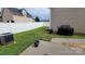 Well-maintained backyard with patio space, privacy fence, and lush lawn at 10732 Trolley Run Dr, Cornelius, NC 28031