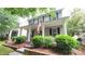 Charming home boasts a covered front porch, well-maintained landscaping, and traditional architectural details at 10732 Trolley Run Dr, Cornelius, NC 28031