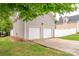 Spacious two-car garage providing ample parking and storage space at 10732 Trolley Run Dr, Cornelius, NC 28031