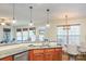 Modern kitchen featuring granite countertops and stainless steel appliances at 10732 Trolley Run Dr, Cornelius, NC 28031