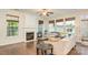 Bright living room with fireplace, hardwood floors, and plenty of natural light at 10732 Trolley Run Dr, Cornelius, NC 28031