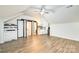 Spacious open living area with lots of natural light offering a modern kitchenette and bathroom at 10732 Trolley Run Dr, Cornelius, NC 28031