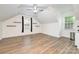 Spacious, open living room features lots of natural light and modern flooring throughout the area at 10732 Trolley Run Dr, Cornelius, NC 28031