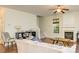 Cozy living room with a fireplace and natural light at 10732 Trolley Run Dr, Cornelius, NC 28031