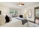 Bright bedroom featuring a large window and view into the bathroom area at 1155 Melrose Dr, Rock Hill, SC 29732