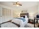 Comfortable bedroom featuring a cozy rug, decorative pillows and an ensuite closet with bi-fold doors at 1155 Melrose Dr, Rock Hill, SC 29732