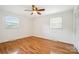 Empty bedroom featuring hardwood floors, with windows on two sides of the room at 1155 Melrose Dr, Rock Hill, SC 29732