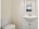 Powder room featuring a modern vanity with sink and a toilet with neutral-colored walls at 1155 Melrose Dr, Rock Hill, SC 29732